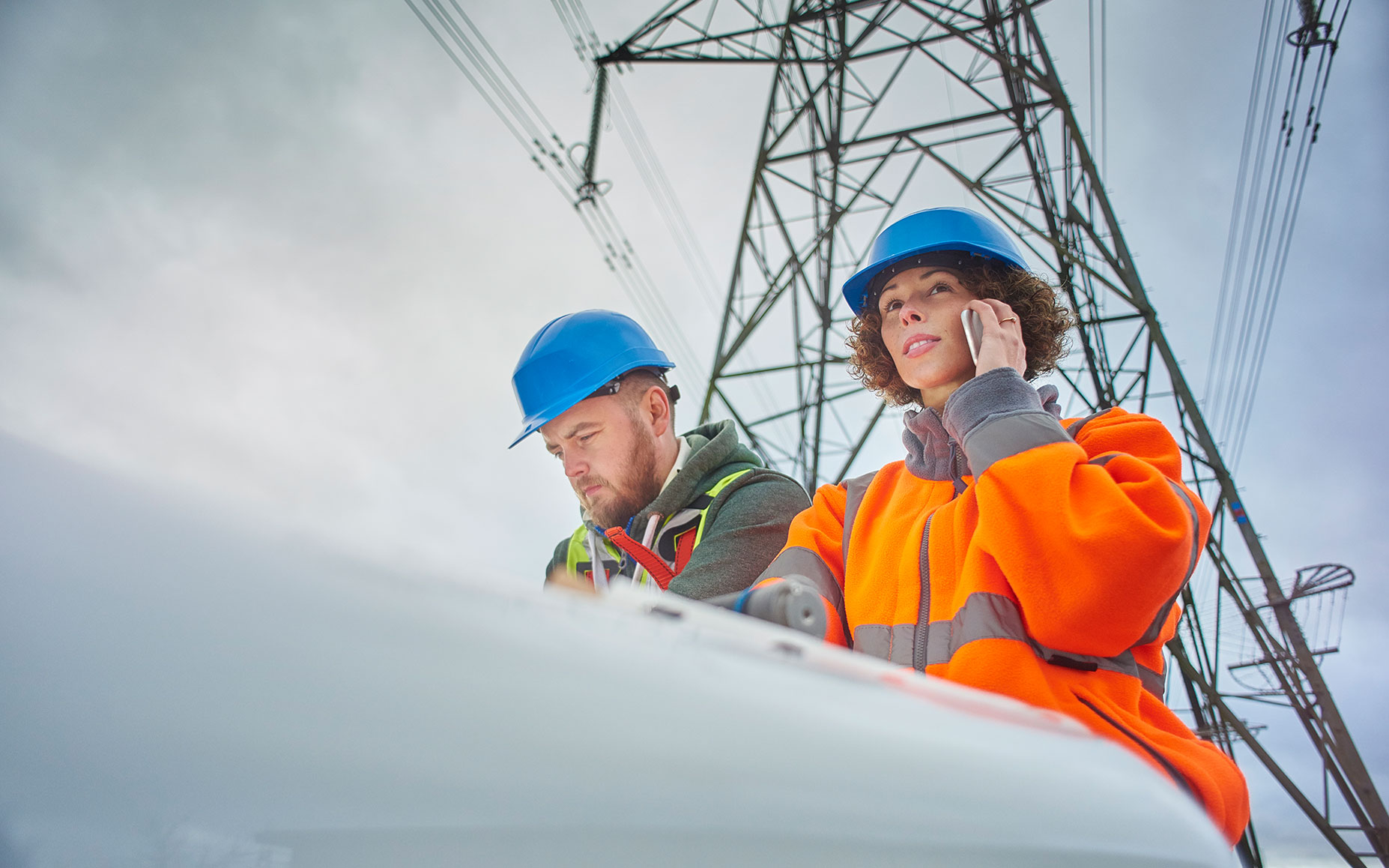 Workers planning how to construct utility lines